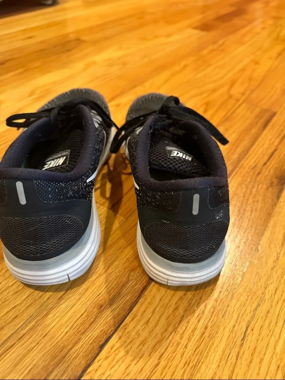 Nike Black and White Women's Flyknit Athletic Sneakers